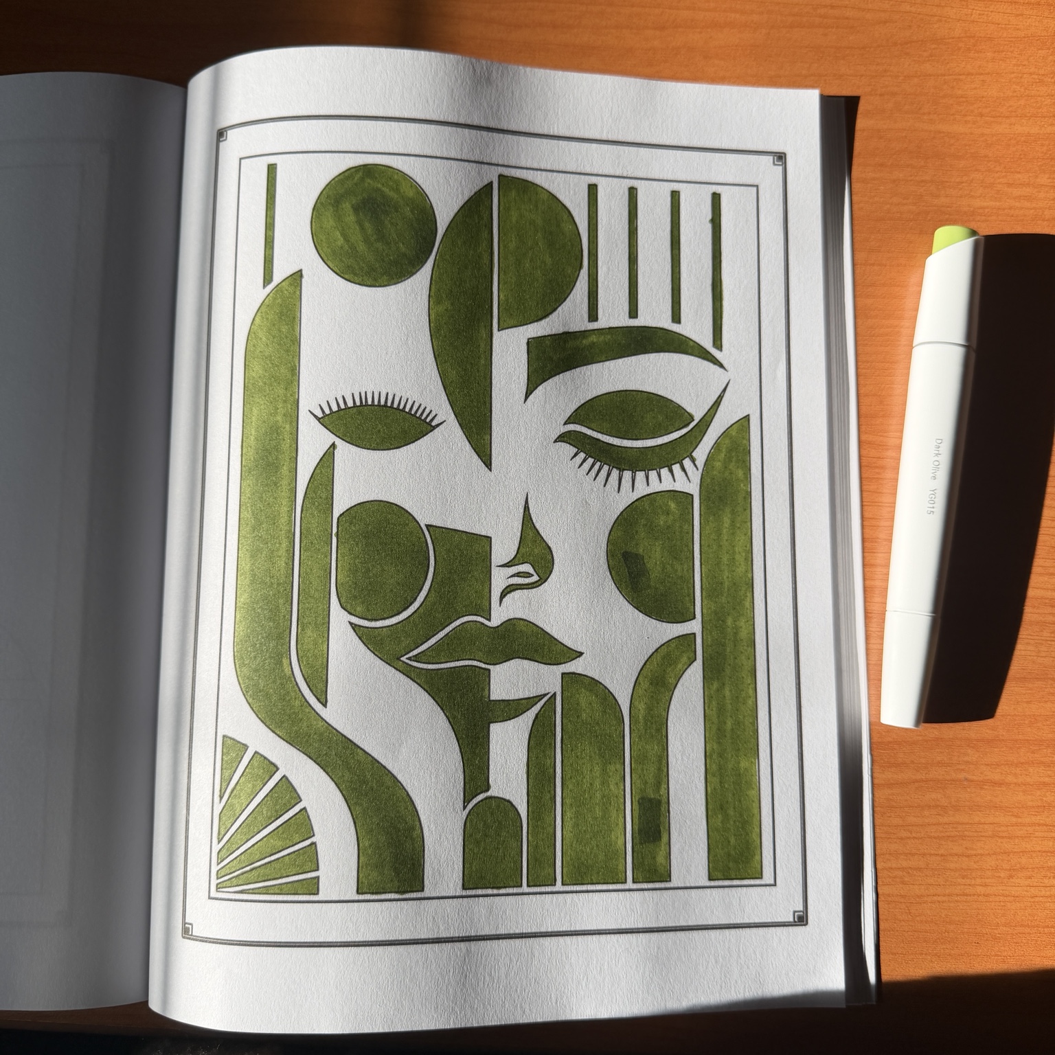Abstract geometric portrait colored in olive green